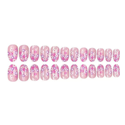 Kunstnagelset mit floralem Design und glitzernden Akzenten Brehn