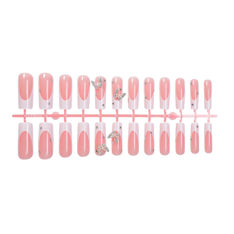 Dekorativer Press-On Nail Kit mit Schmetterlingsakzenten Brehn