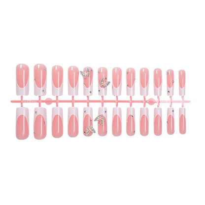 Dekorativer Press-On Nail Kit mit Schmetterlingsakzenten Brehn
