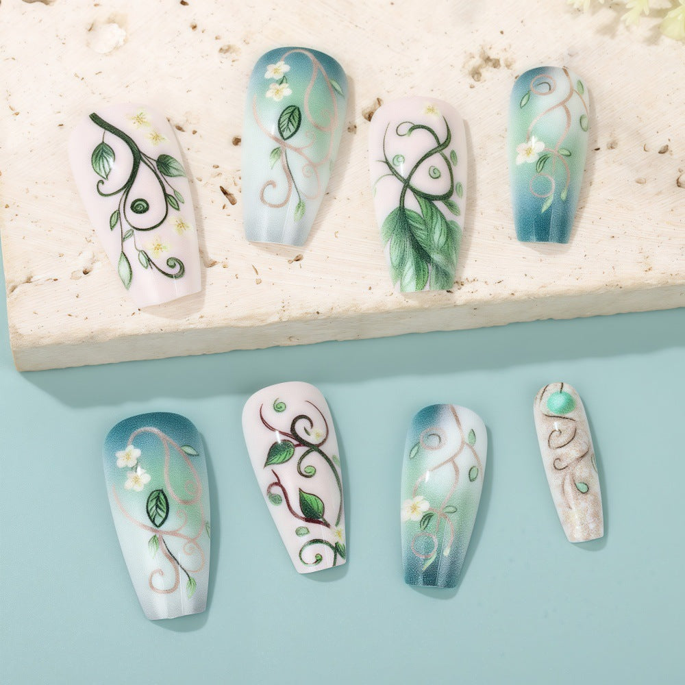 Kunstnägel Set mit floralen Designs Brehn