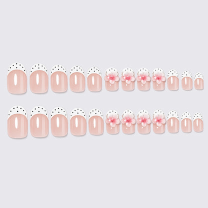 Kunstnagelset mit floralem und gepunktetem Design Brehn