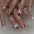 Dekoratives Press-On Nagelkunstset mit 3D-Schleifen- und Kirschdesigns Brehn