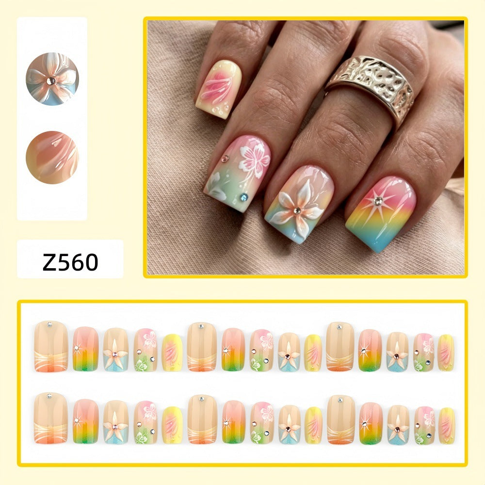 Kunstnägel im lebhaften floralem Design mit Glitzerakzenten Brehn