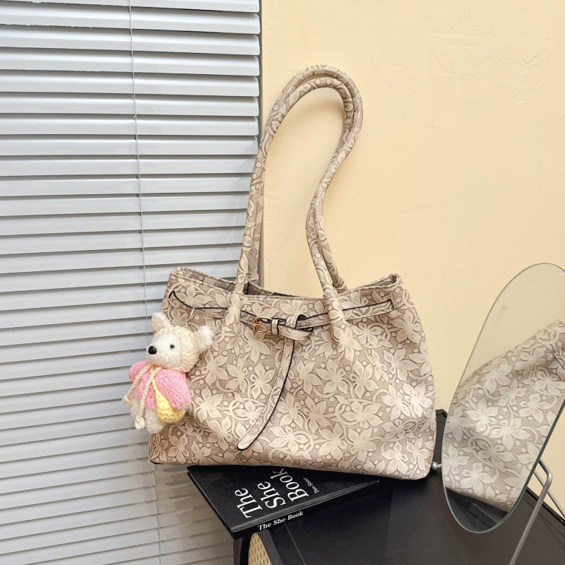 Elegante Handtasche mit floralem Muster