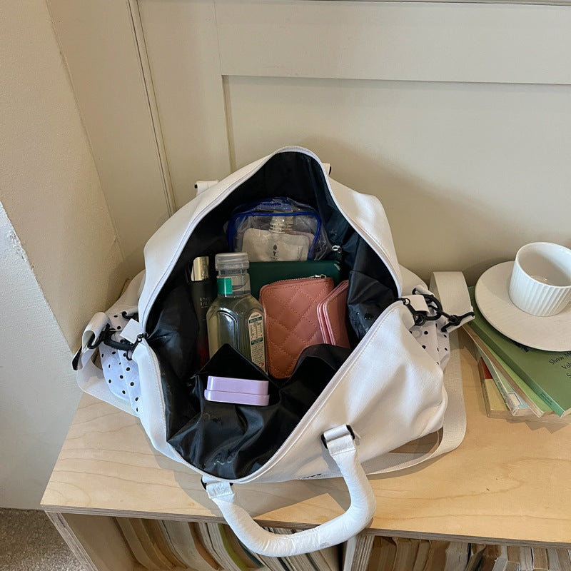 Stilvolle gepunktete Reis-Tasche Brehn