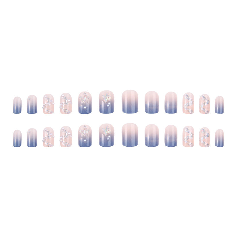 Kunstnagelset mit funkelnden Glitzer-Elementen und ansprechendem Ombre-Design Brehn