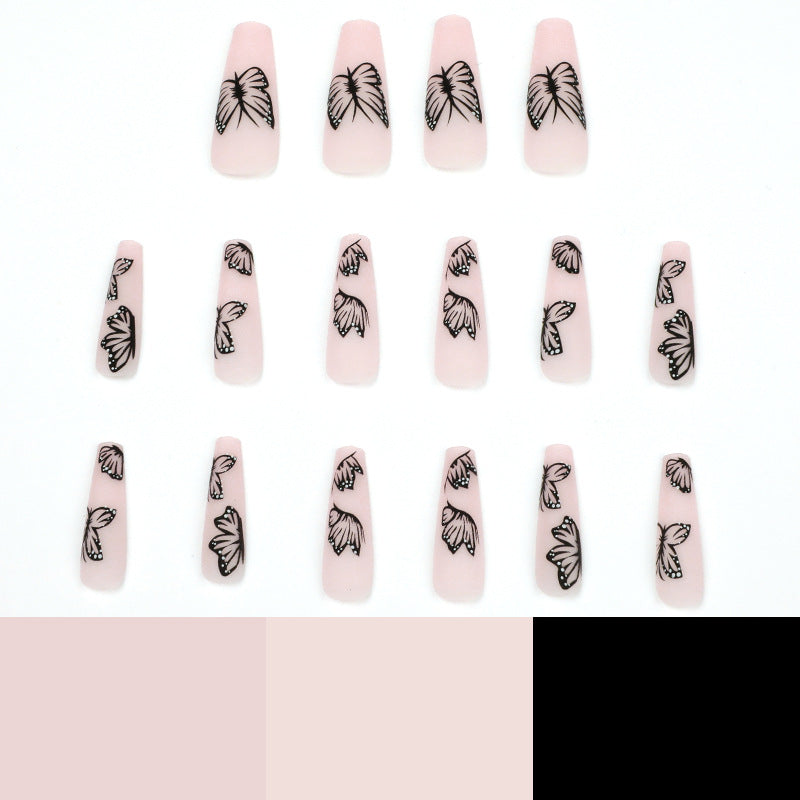 Kunstvolle Nagelverlängerungen mit Schmetterlingsdesign Brehn