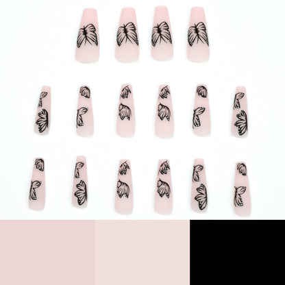 Kunstvolle Nagelverlängerungen mit Schmetterlingsdesign Brehn