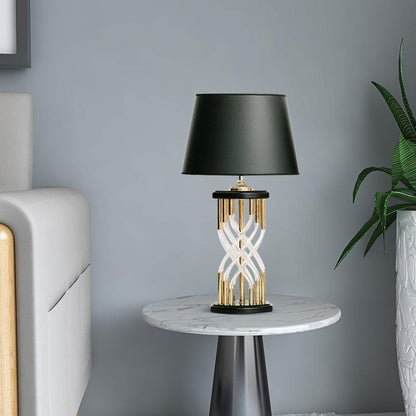 Moderne dekorative Tischlampe mit skulpturaler Basis