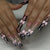 Kunstvolle Acryl-Nägel mit floralem Design und Strass-Bow Brehn