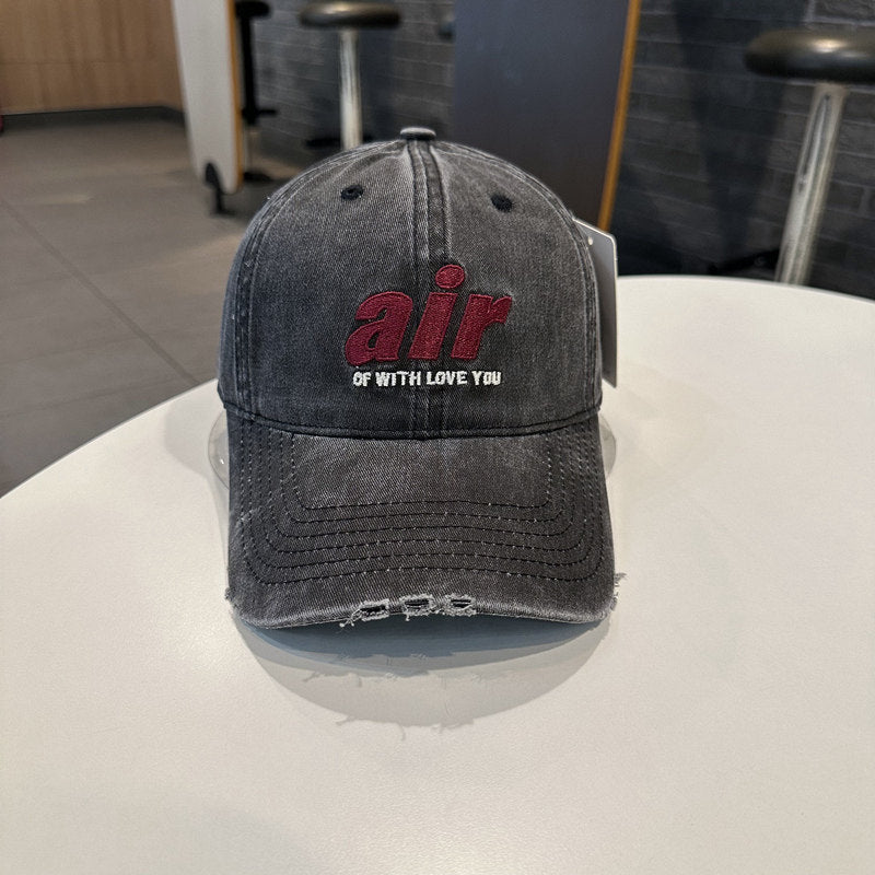 Abgeschabte Denim-Baseballmütze mit einzigartiger Bestickung