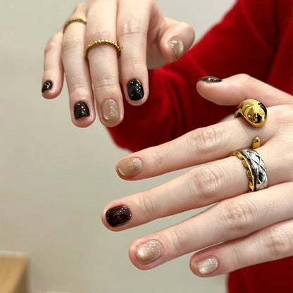 Kunstvolle Nagelverlängerungen mit elegantem Glitzer- und Ombre-Design Brehn