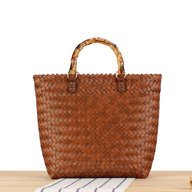 Handtasche Aus Hochwertigem Geflochtenem Material mit Bambusgriffen Brehn