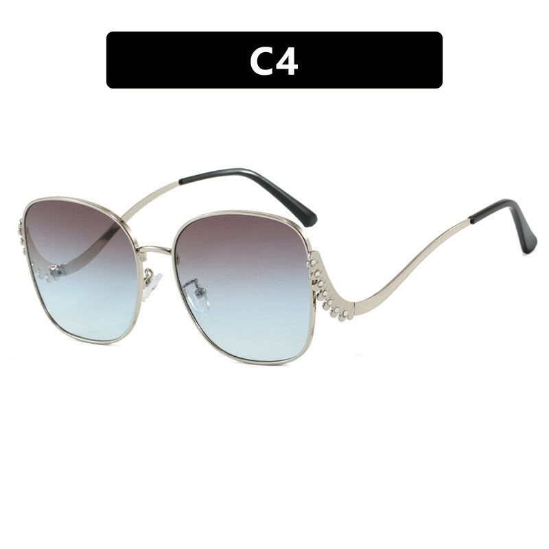 Damen auffällige Sonnenbrille mit funkelnden Applikationen Brehn