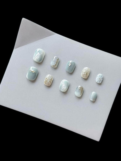 Künstlerisches Press-On Nagelset mit elegantem Marmor Design