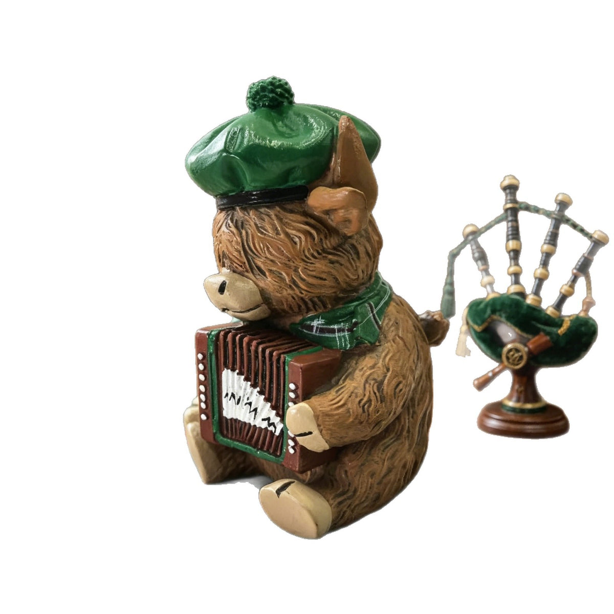 Dekorative Hochlandrind Figur mit Akkordeon Brehn