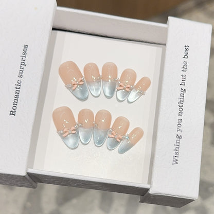 Kunstnagelset mit Romantischen Schleifen- und Glitzerakzenten Brehn
