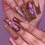 Künstliche Nagelverlängerungen mit eleganten Edelsteinverzierungen Brehn