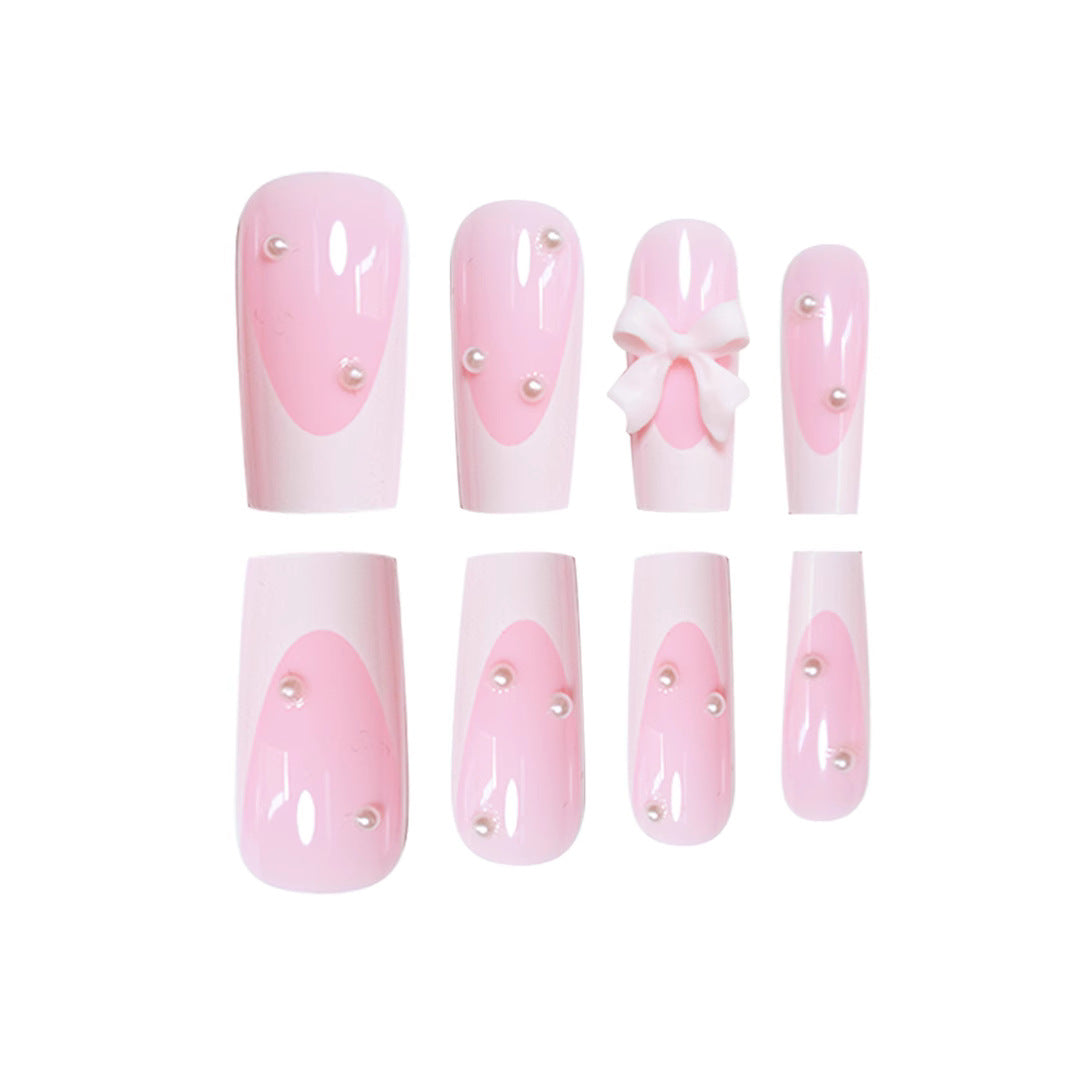 Dekorative Presse-Nagelkunst mit Schleifendetails Brehn
