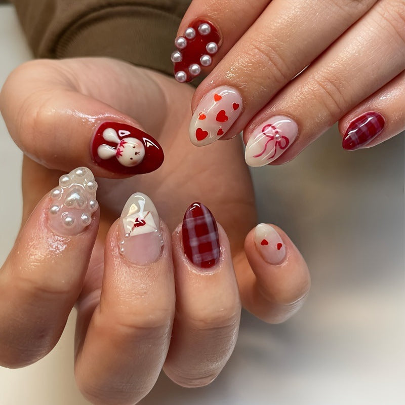 Kreatives Kunstnagelset mit niedlichen Hasen- und Herzen-Motiven Brehn