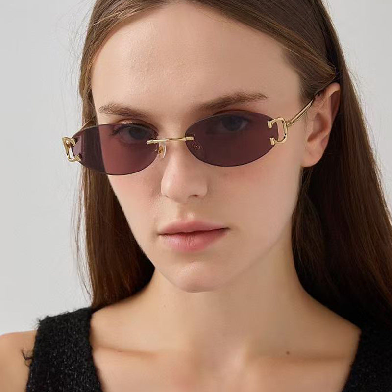 Damen elegante ovalförmige Sonnenbrille mit modischem Metallrahmen Brehn