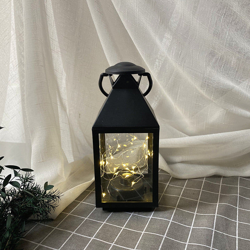 Dekorative Metall- und Glaslaterne mit warmen LED-Feenlichtern Brehn