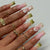 Künstlerische florale Press-On-Nagelerweiterungen Brehn