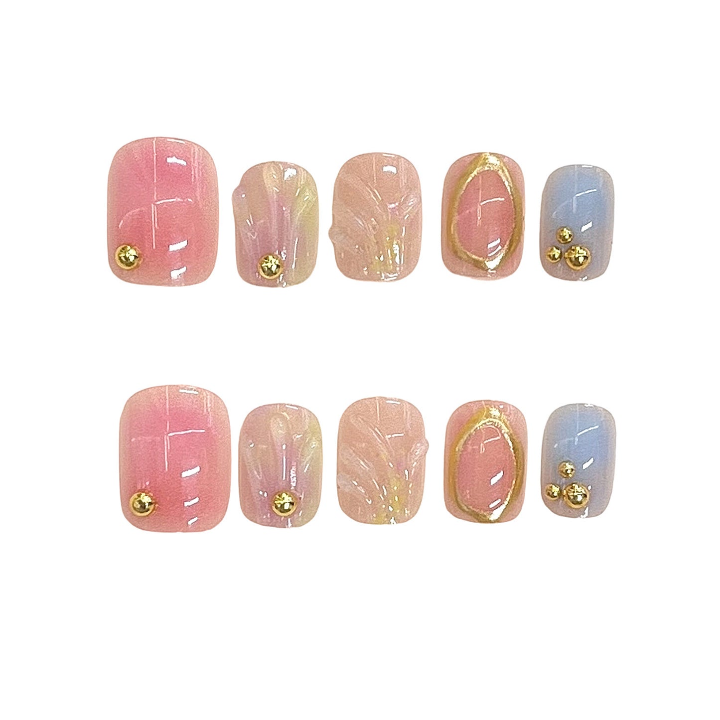Dekorativer Press-On Nagelset mit goldenen Akzenten Brehn