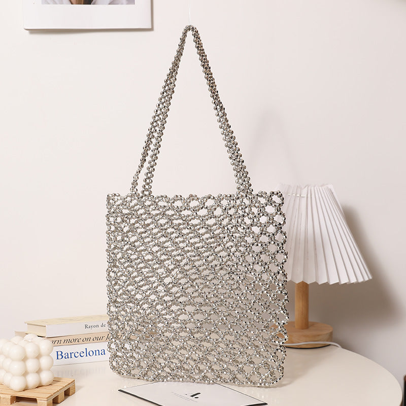 Glitzernde Netzhandtasche Aus Geflochtenem Material Brehn