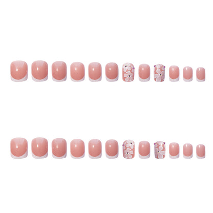 Kunstnagelset mit elegantem French Design und floralen Akzenten Brehn