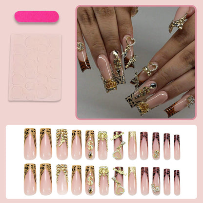 Kunstnagelset mit eleganten goldenen und tierischen Verzierungen Brehn