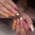 Kunstvolle Nagelkunst mit fruchtigen Designs Brehn
