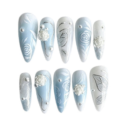 Kunstnagelset mit elegant floralen Motiven und Glitzereffekten Brehn