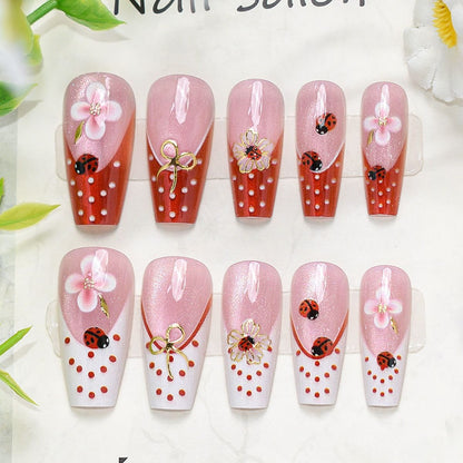 Künstlerische florale Press-On-Nageltips Brehn