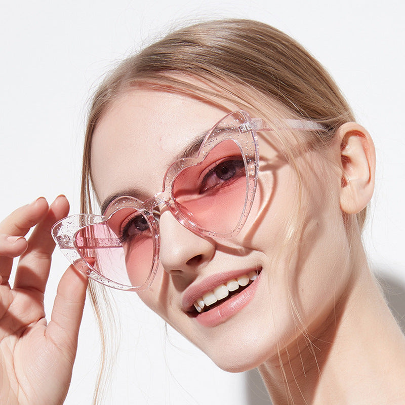 Damen Herzförmige Sonnenbrille mit glitzerndem Rahmen Brehn