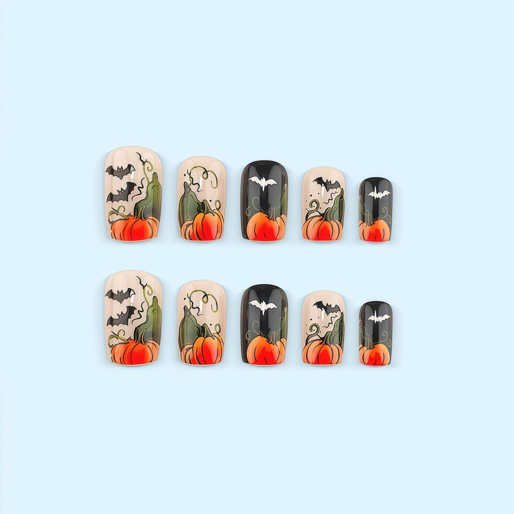 Kunstnägel im Halloween-Design mit Kürbissen und Geistern Brehn