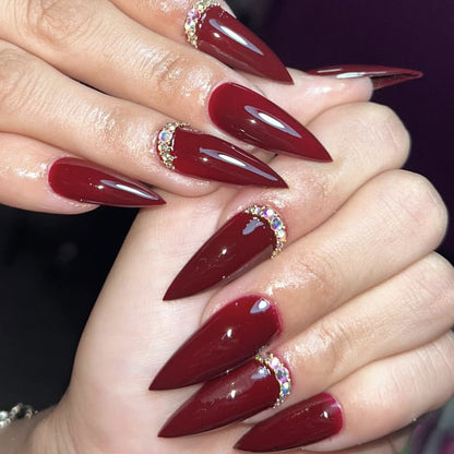Elegante Stiletto-Nagelkunstverlängerungen mit Glitzerakzenten Brehn
