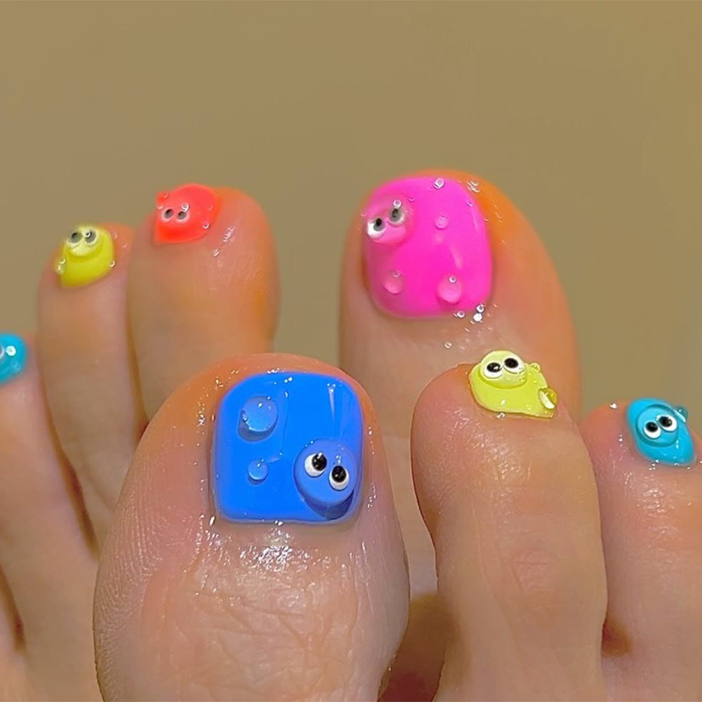 Fußnagelkunst mit Bunten Cartoon-Motiven Brehn