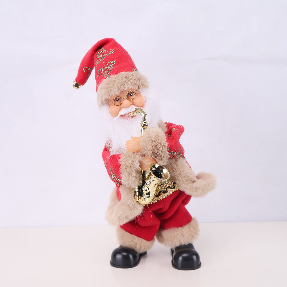 Dekorative Weihnachtsmannfigur mit Süßigkeit