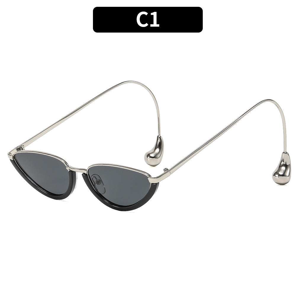 Skulpturale Retro-inspirierte Katzenaugen-Sonnenbrille