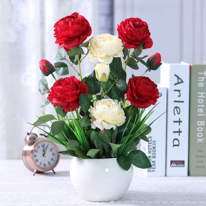 Künstliches Blumenarrangement in modernem Keramikvase