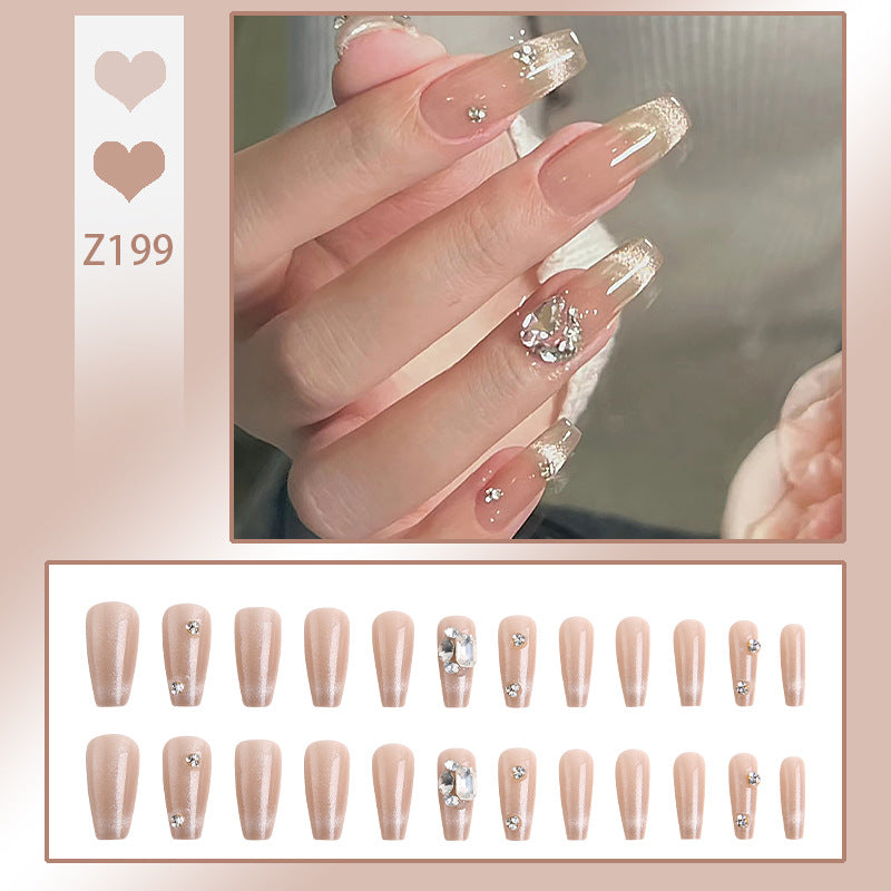 Kunstnagelset mit glamourösen Glitzerakzenten und eleganten Schmuckverzierungen Brehn