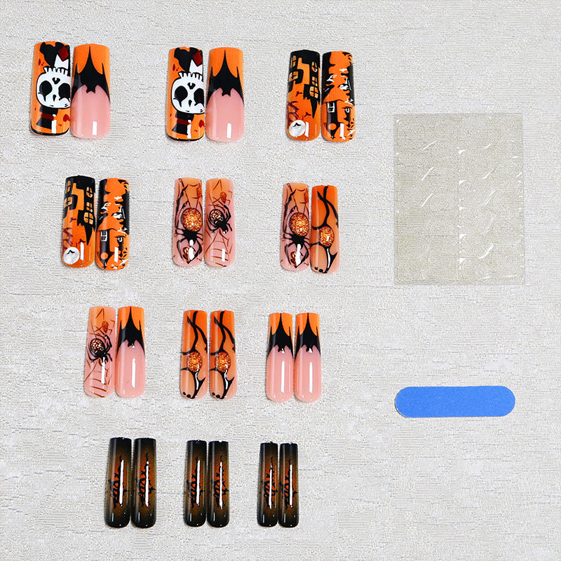 Kunstnagelset mit Halloween-Motiven und kreativem Glitzer Brehn