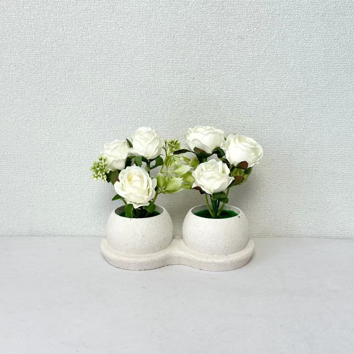 Elegante Blumenpflanzanordnung