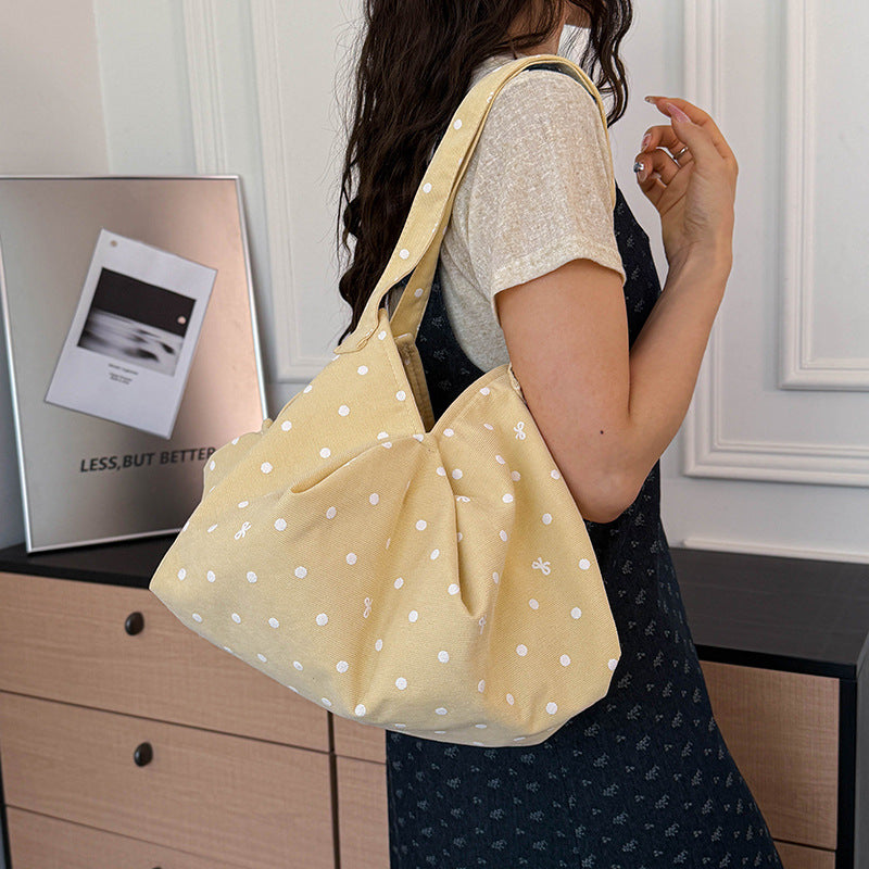 Moderne gepunktete Schultertasche