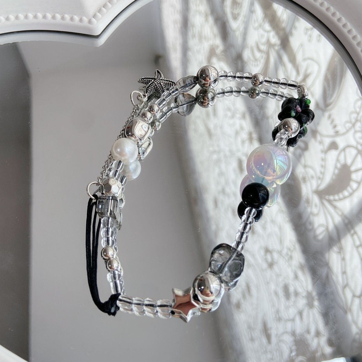 Eleganter Perlen-Charm-Brillenhalter Brehn
