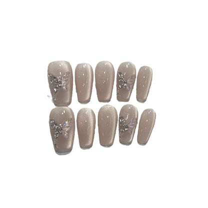 Stilvolles Press-On Nagelkunst-Set mit eleganten Schmetterlings- und Juwelenelementen Brehn