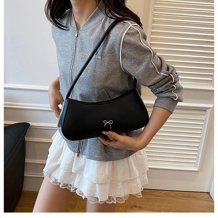 Elegante geschwungene Handtasche Brehn