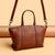 Texturierte Lederhandtasche Brehn