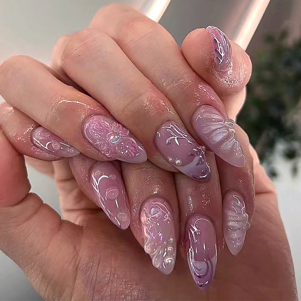 Künstliche Nagelverlängerungen mit filigranen Blumendesigns und Glitzerakzenten Brehn